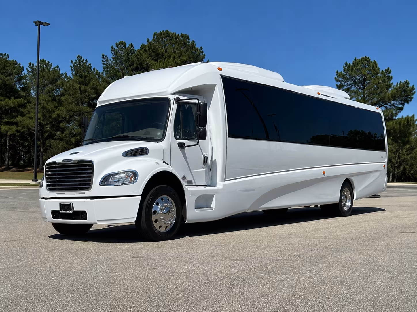 Group beside a Mercedes Sprinter limo in Spokane Valley
